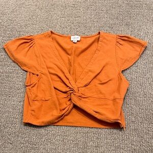 Le Lis Orange Twist Front Crop Top